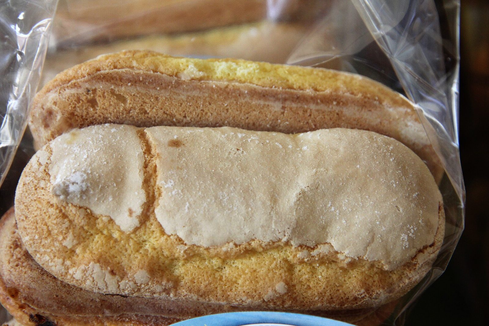 Savoiardi — golden sponge biscuits dusted with sugar