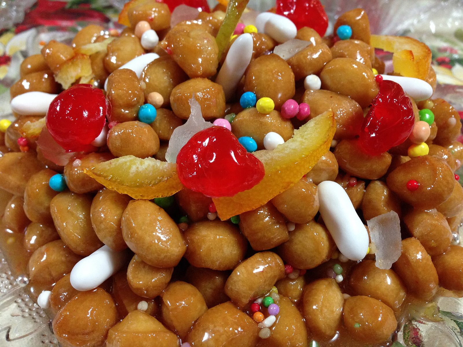 Struffoli — honey-glazed fried dough pearls dressed with sprinkles
